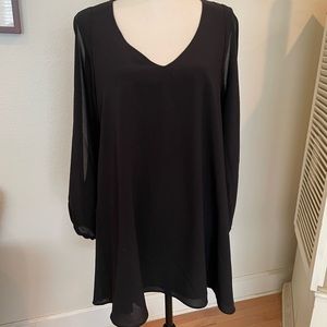 Black swing dress with long open sleeves